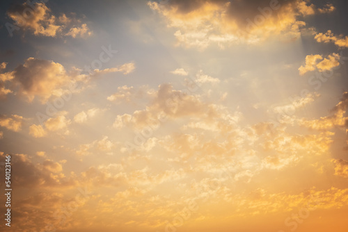 Fototapeta Naklejka Na Ścianę i Meble -  Sunset cloudy sky with the orange sun