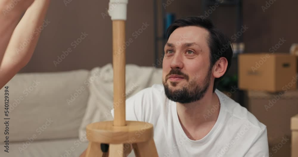 Moving day happy family, dad and mom, woman and husband moving to new