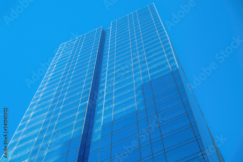 Towering apartment or office with cloudless blue sky background in Austin Texas