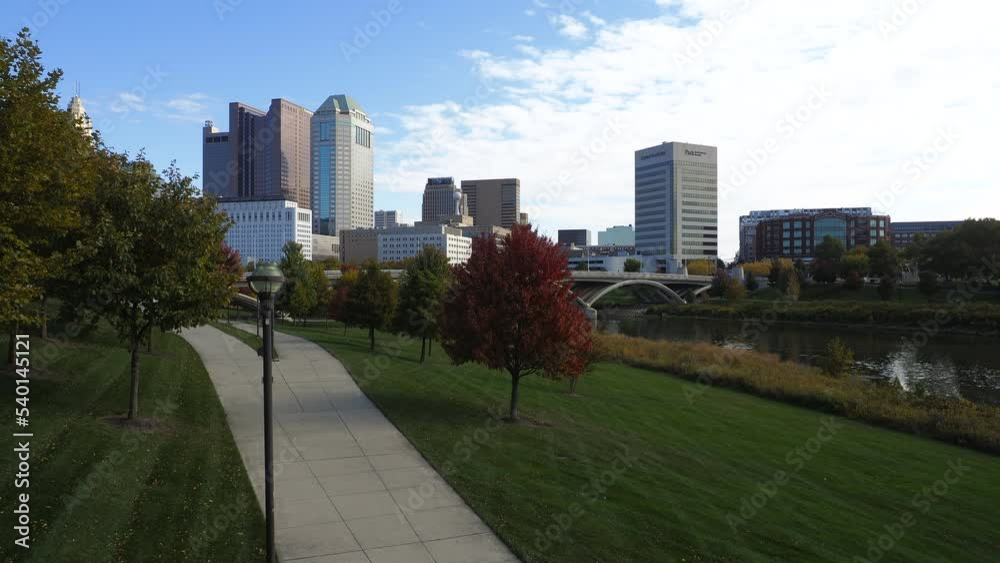 Time Lapse of the Columbus Ohio Downtown River Walk along the Scioto River with skyline in background 