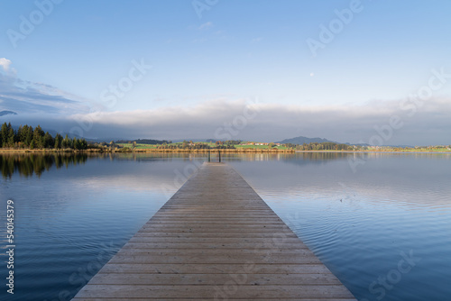 Fototapeta Naklejka Na Ścianę i Meble -  Mountain lake in the early morning somewhere in the german alps