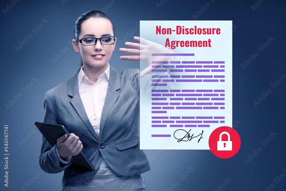 Businesswoman in non disclosure agreement concept Businesswoman in non disclosure agreement concept