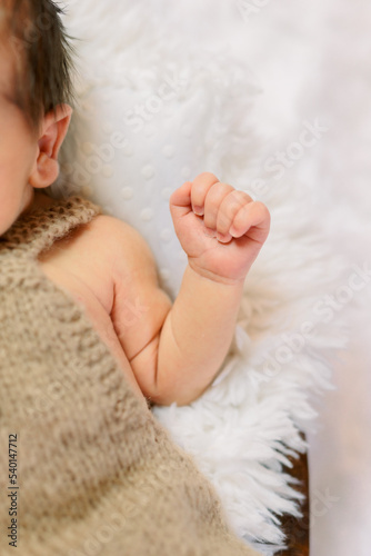 Adorable newborn baby hands and fingernails. 