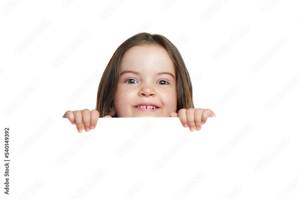 Closeup picture of a preschool girl holding blank board in hands Closeup picture of a preschool girl holding blank board in hands