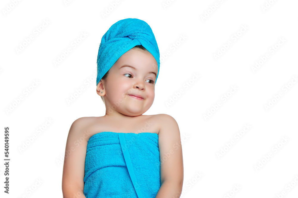 Surprised little girl in a towel looking to the side Surprised little girl in a towel looking to the side