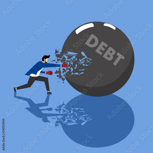 a businessman who destroys debt balls. Struggles to be debt free. Debt and credit, Struggle for your business, Debt settlement business concept