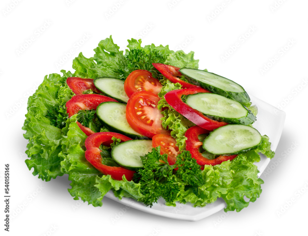 Close-up photo of fresh salad with vegetables in white plate Close-up photo of fresh salad with vegetables in white plate