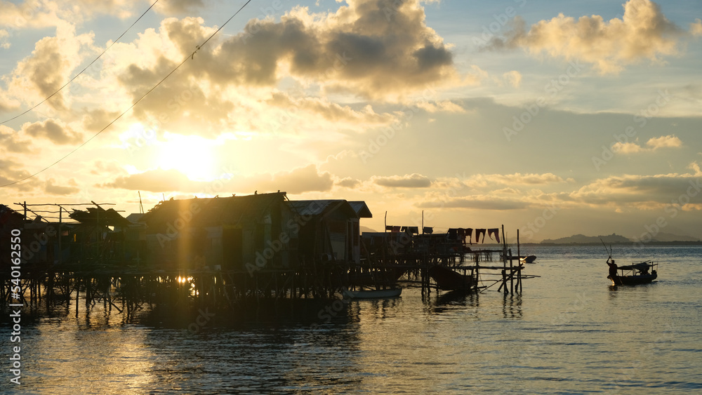 Beautiful sunset time at a bajau village, Pulau Omadal.