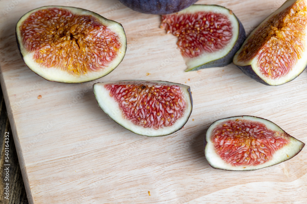 Ripe sweet figs cut into pieces Ripe sweet figs cut into pieces