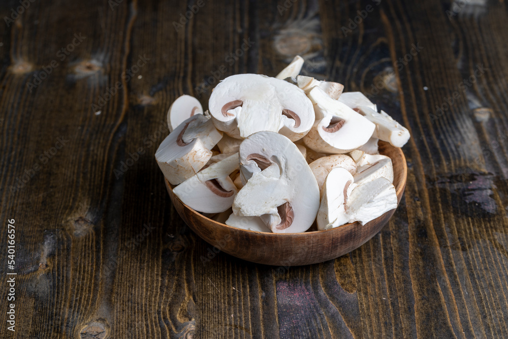 Sliced mushrooms on a board
