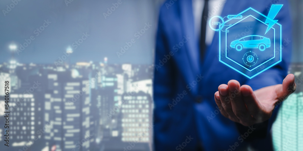 Choosing an electric vehicle. electric car choice. pointing at symbol on charging machine