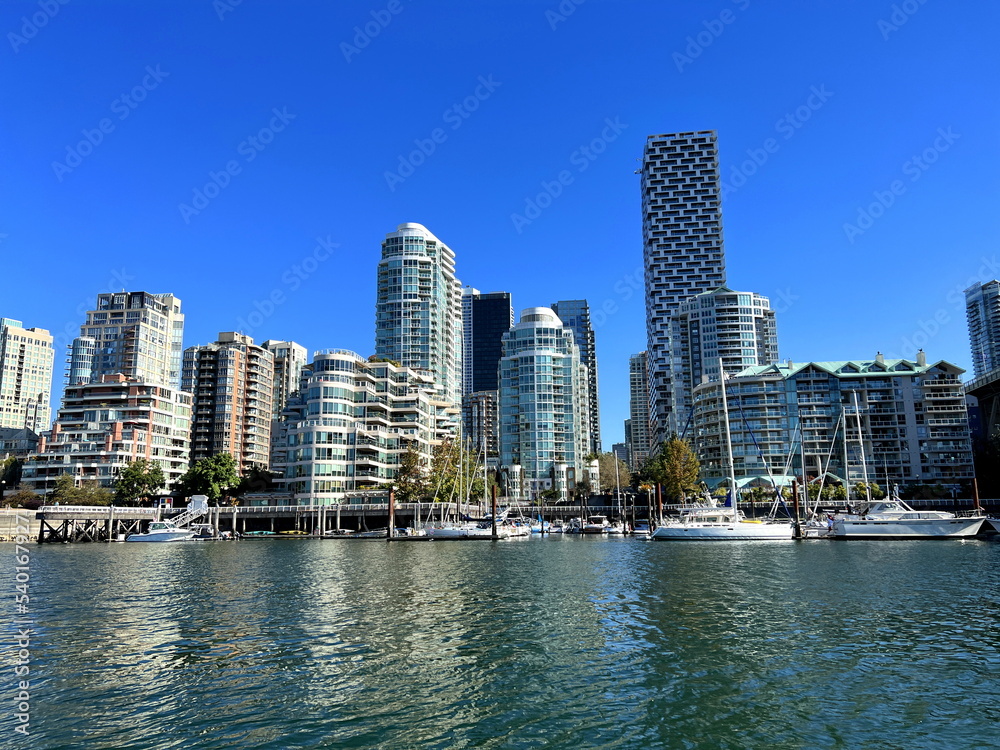 Granville Island peninsula and shopping district in Fairview district of Vancouver BC across False Creek from downtown Vancouver under southern end of the Granville Street Bridge 09.2022 Canada