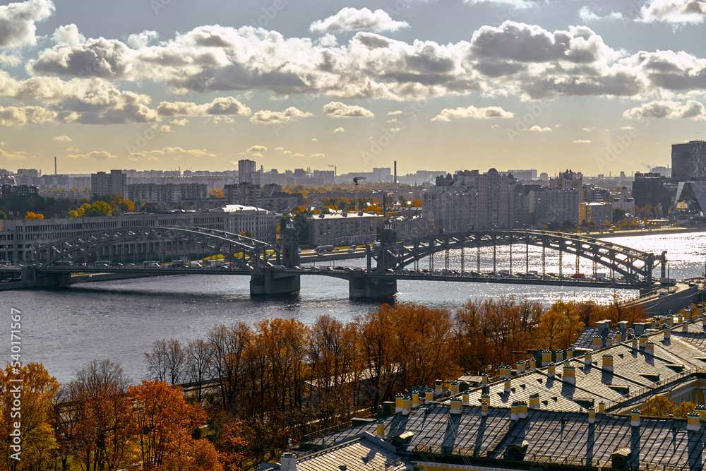Drawbridge across the river. Autumn city from above. Drawbridge across the river. Autumn city from above.