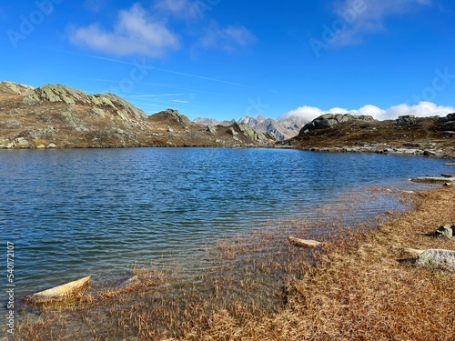 Early autumn on the alpine lakes Laghi della Valletta in the mountainous area of the St. Gotthard Pass (Gotthardpass), Airolo - Canton of Ticino (Tessin), Switzerland (Schweiz) photo