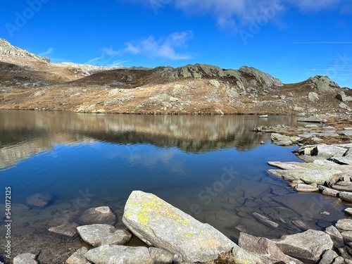 Early autumn on the alpine lakes Laghi della Valletta in the mountainous area of the St. Gotthard Pass (Gotthardpass), Airolo - Canton of Ticino (Tessin), Switzerland (Schweiz) photo