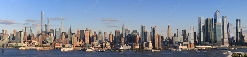 Fototapeta premium Aerial view of Manhattan Midtown skyscrapers skyline panorama before sunset, New York City, USA