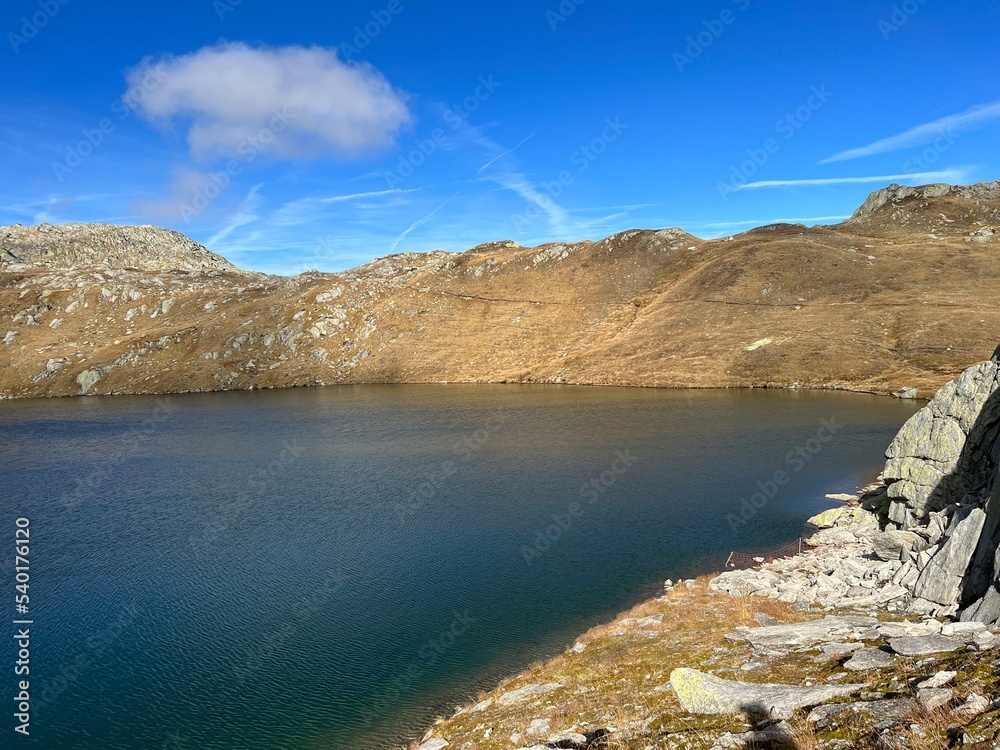 Early autumn on the alpine lakes Laghi della Valletta in the mountainous area of the St. Gotthard Pass (Gotthardpass), Airolo - Canton of Ticino (Tessin), Switzerland (Schweiz) Early autumn on the alpine lakes Laghi della Valletta in the mountainous area of the St. Gotthard Pass (Gotthardpass), Airolo - Canton of Ticino (Tessin), Switzerland (Schweiz)