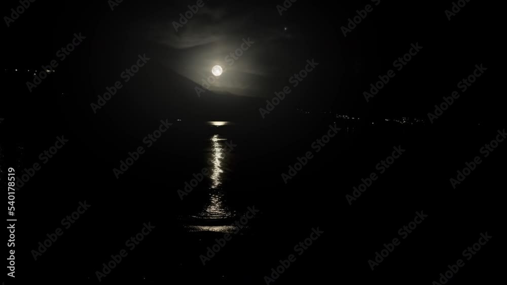 night full moon and moonbeam in sea. High quality 4k footage