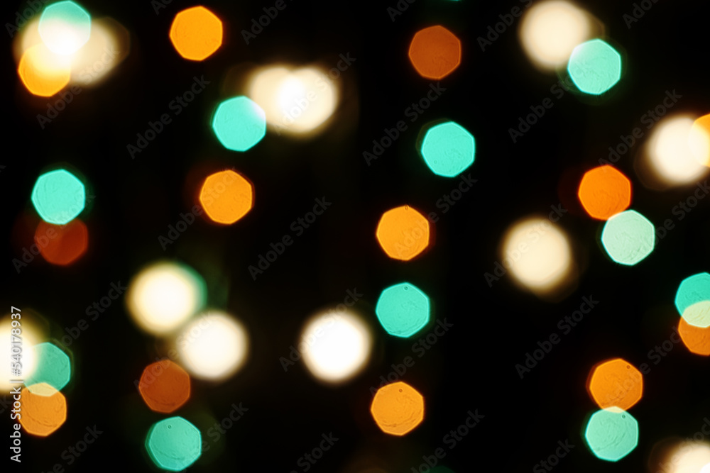 Obraz premium multicolored festive lights on a black background screensaver backdrop