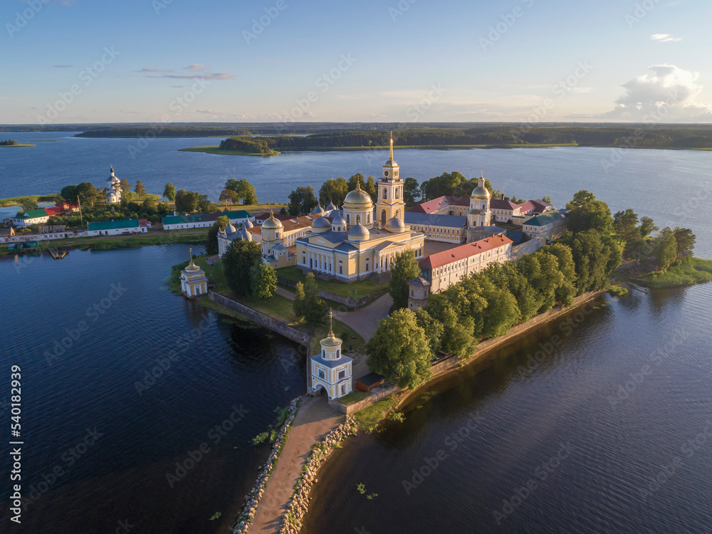 Fototapeta premium View from the height of the Nilo-Stolobensky Monastery in the July evening (aerial photography). Tver region, Russia