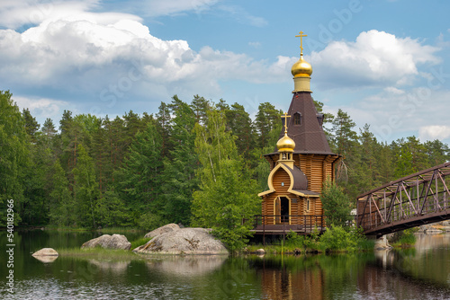 Church of the Apostle Andrew the First-Called on the river Vuoksa on a June morning. Vasilyevo, Leningrad region. Russia photo