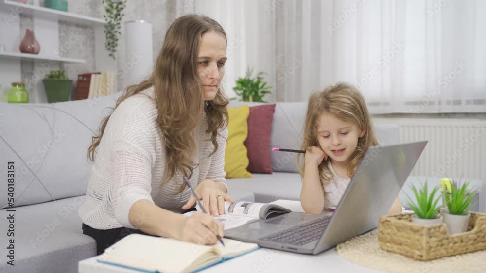 Business woman mother works in home office.
Businesswoman works in her home office and takes care of her little daughter.
Business woman mother works in home office.
Businesswoman works in her home office and takes care of her little daughter.