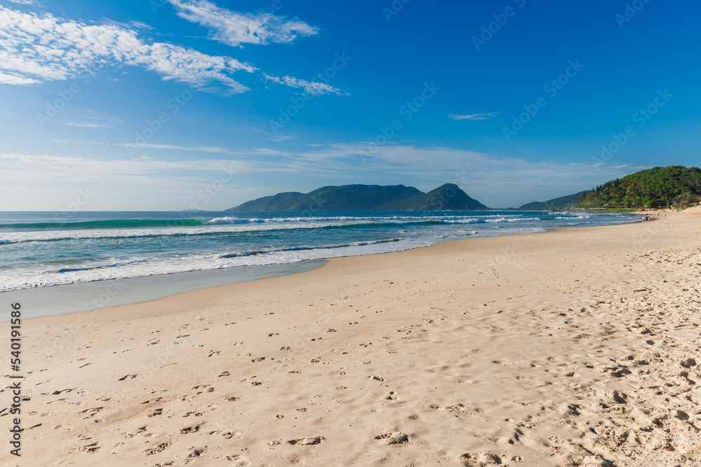 Morro das Pedras beach and ocean with waves. Brazil, Florianopolis
