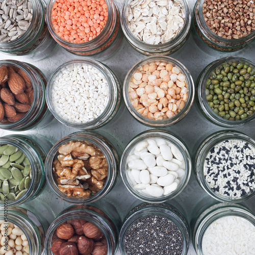 Vegan protein source. assortment of healthy vegetarian food. top view of seeds, nuts, peas, rice, oatmeal on white background square