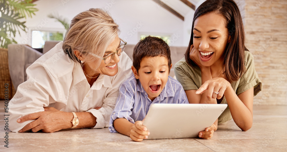 Tablet, e learning and wow of child with grandmother for online education, internet games or website teaching. Senior woman and mom with support, love and helping kindergarten kid on technology app Tablet, e learning and wow of child with grandmother for online education, internet games or website teaching. Senior woman and mom with support, love and helping kindergarten kid on technology app