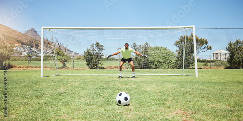 Canvas Print Goalkeeper, soccer field and sports man ready in penalty kick, competition game challenge and football field pitch defense