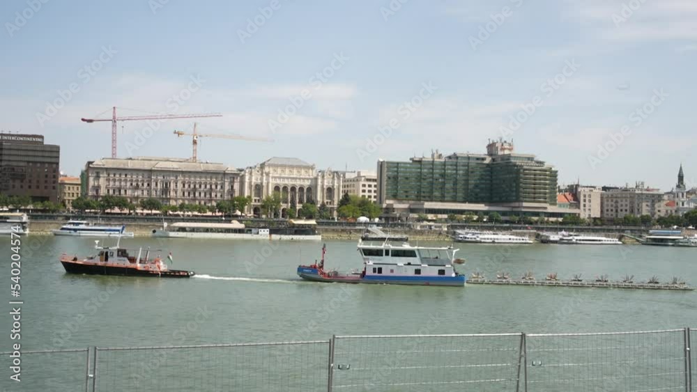 Commercial ships on a river hauling a heavy load Commercial ships on a river hauling a heavy load