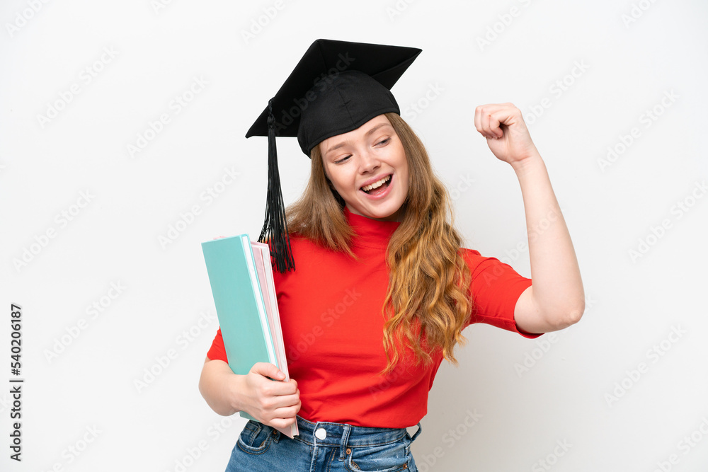 Young university graduate woman isolated on white background celebrating a victory Young university graduate woman isolated on white background celebrating a victory