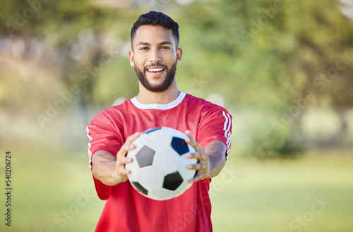 Soccer player, soccerball and sports man with ball after training exercise for game competition. Happy football athlete, smiling and ready for professional athletic sport peformance for match fitness © Beaunitta V W/peopleimages.com