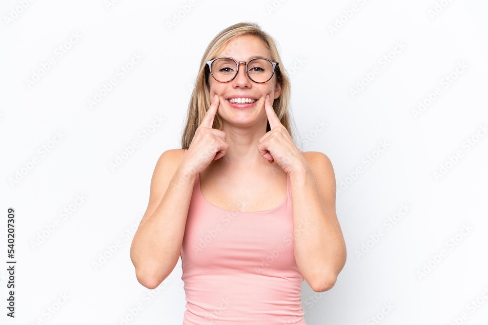 Young caucasian woman isolated on white background smiling with a happy and pleasant expression