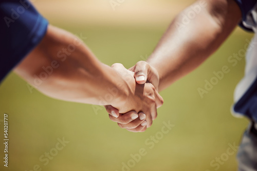 Closeup, handshake and baseball for game, match or contest with respect in sport on field. Shaking hands, man and baseball player in competition, together or motivation for success, greeting or unity © Beaunitta V W/peopleimages.com