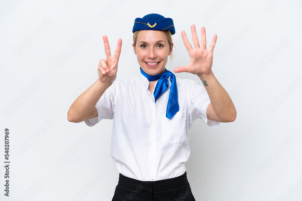 Airplane blonde stewardess woman isolated on white background counting seven with fingers Airplane blonde stewardess woman isolated on white background counting seven with fingers