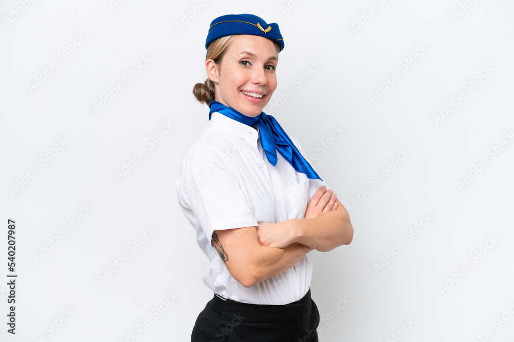 Airplane blonde stewardess woman isolated on white background with arms crossed and looking forward Airplane blonde stewardess woman isolated on white background with arms crossed and looking forward