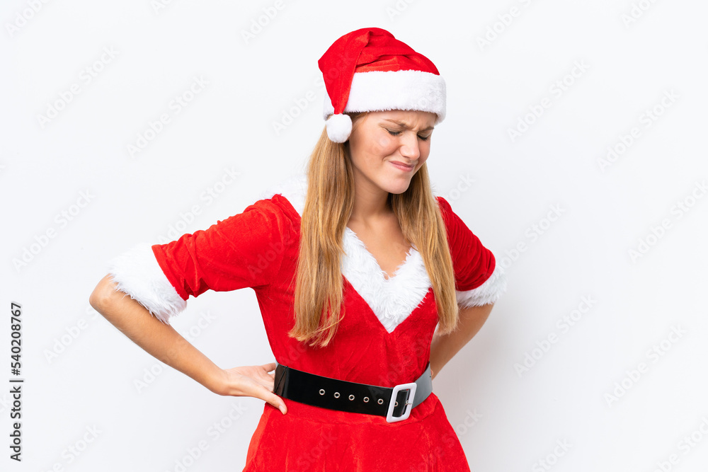 Young caucasian woman dressed as mama noel isolated on white background suffering from backache for having made an effort Young caucasian woman dressed as mama noel isolated on white background suffering from backache for having made an effort