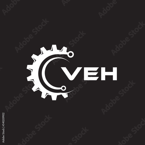 VEH letter technology logo design on black background. VEH creative initials letter IT logo concept. VEH setting shape design.
 photo