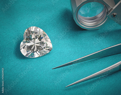 Heart Shaped Diamond with Lens and Tweezers on Turquoise Background.  photo