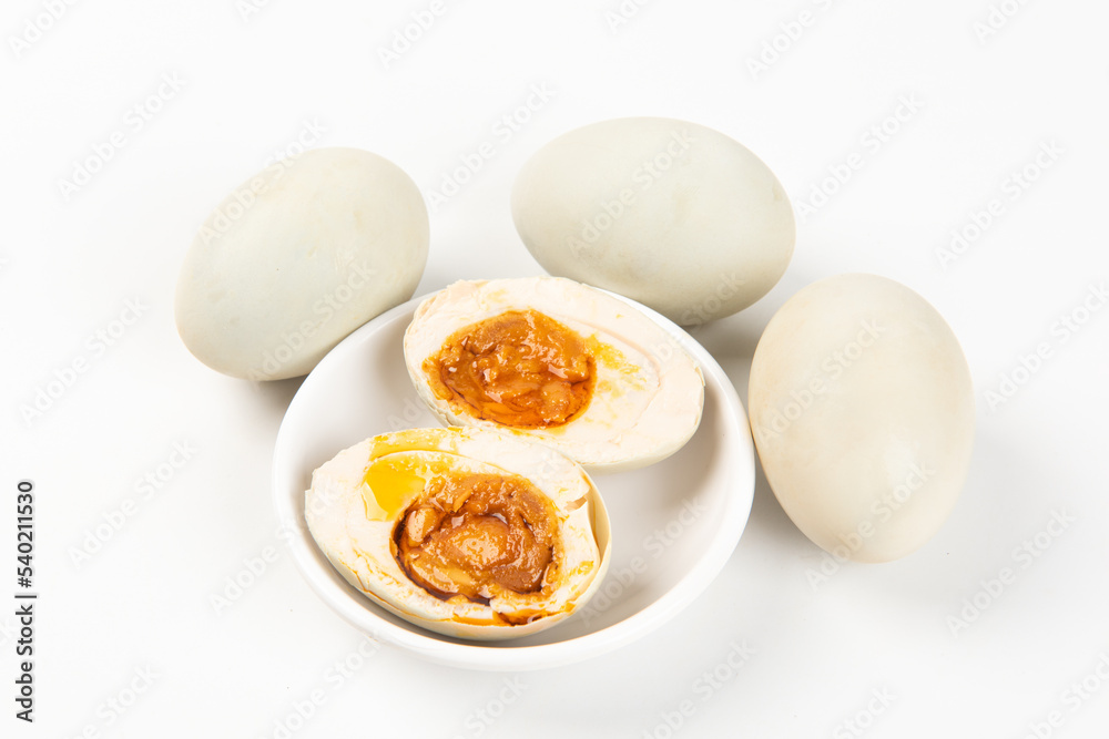 preserved Salted duck eggs with egg yolk on white background preserved Salted duck eggs with egg yolk on white background