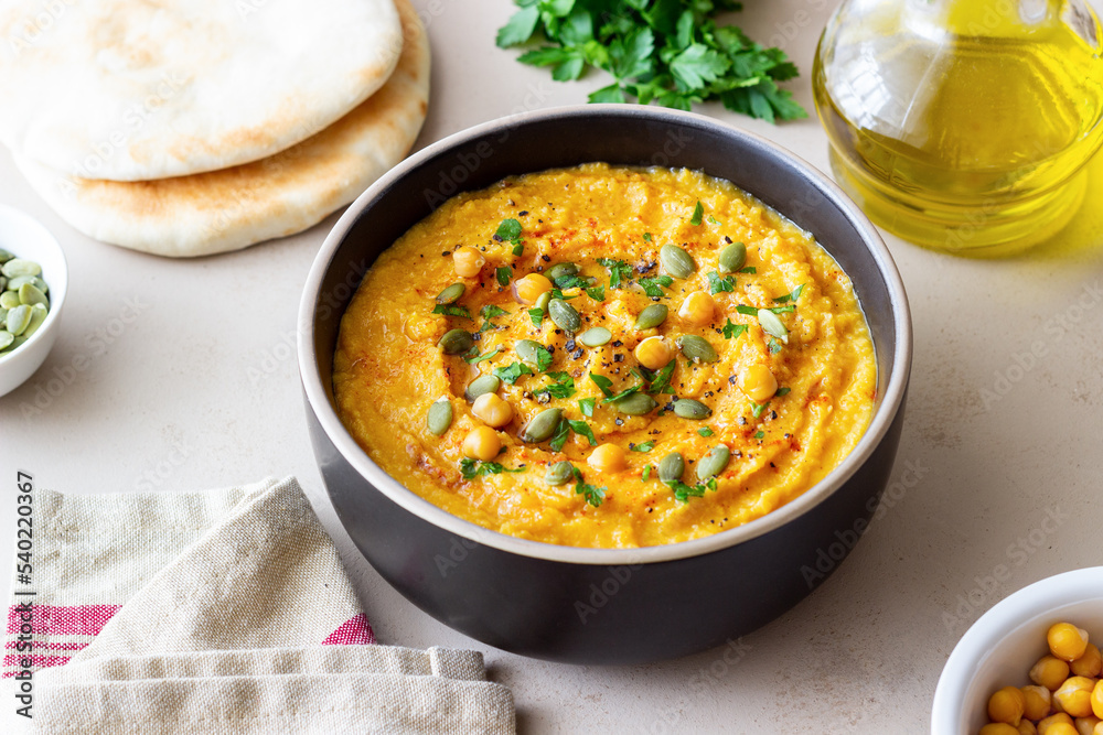 Pumpkin hummus with seeds and greens. Healthy eating. Vegetarian food. Pumpkin hummus with seeds and greens. Healthy eating. Vegetarian food.