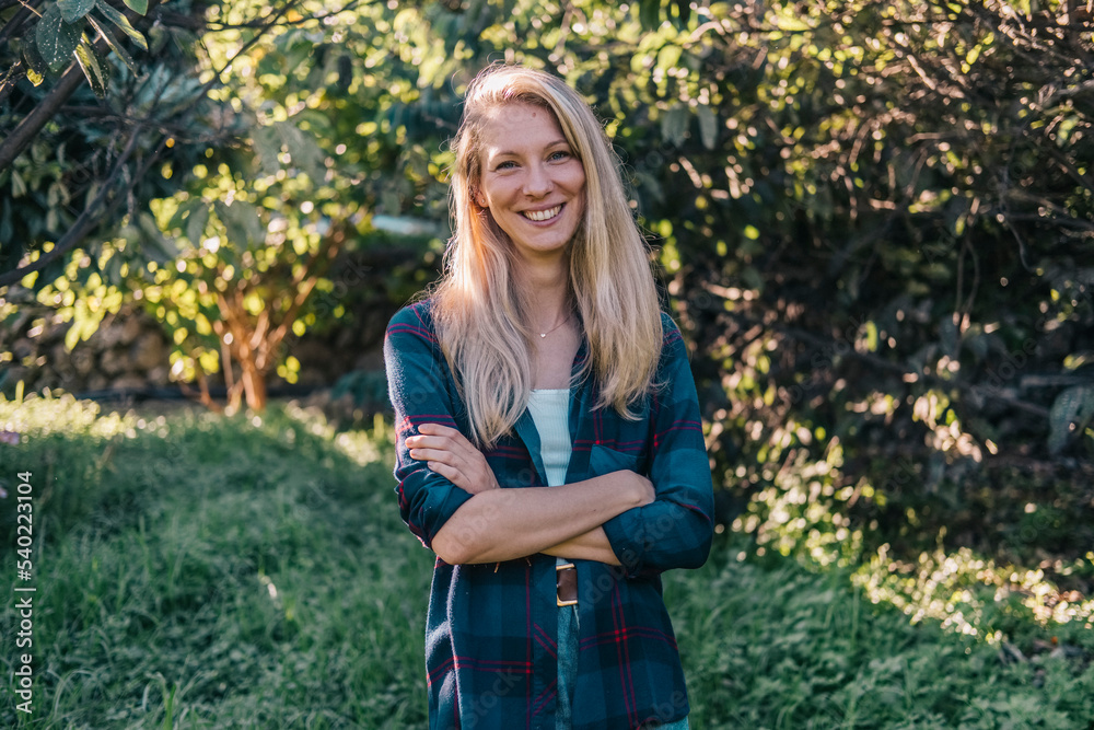 Portrait of a smiling young Caucasian woman in a natural setting. Portrait of a smiling young Caucasian woman in a natural setting.