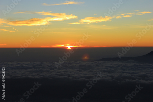 sunset over the cloud © Heru