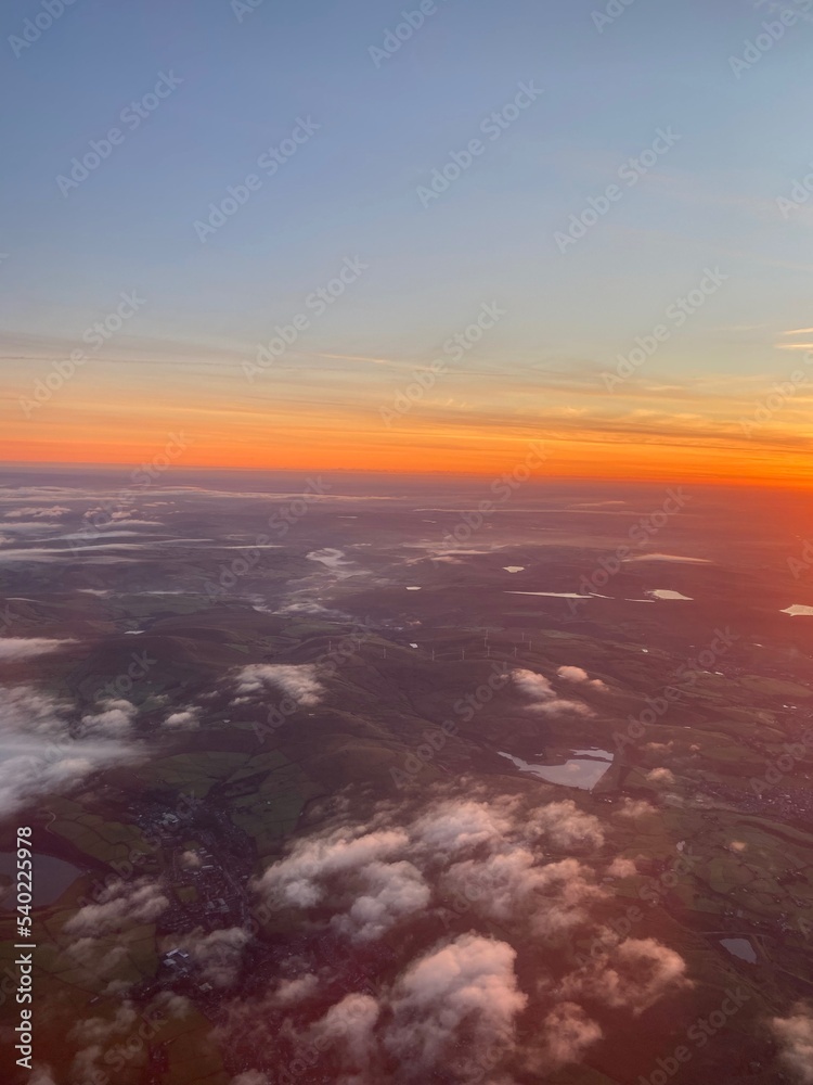 View flying over Peak District at sunrise on a foggy morning