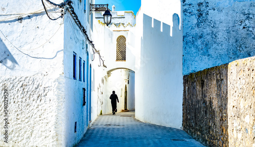 Beautiful view of street with typical arabic architecture. Location: Asilah, North Morocco, Africa. Artistic picture. Beauty world © olenatur