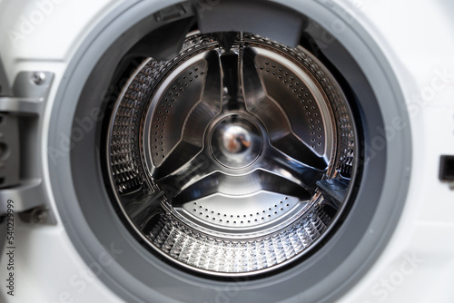 White washing machine drum inside