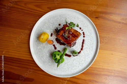 Closeup of Dongpo pork served with delicious garnishes photo