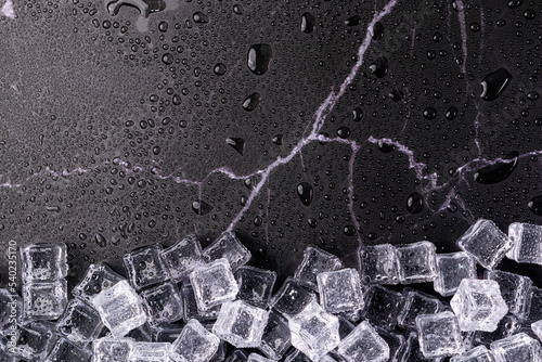 ice cubes on a black background