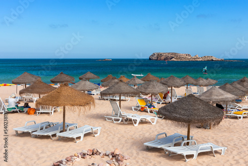 Beach with umbrellas near Sagres, Algarve, Portugal
